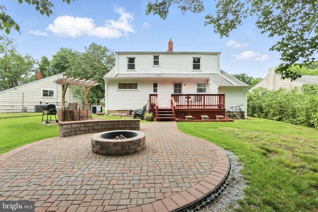 6937 Halleck St, District Heights, MD 20747 - back of property with a fire pit, a pergola, a patio area, and a wooden deck