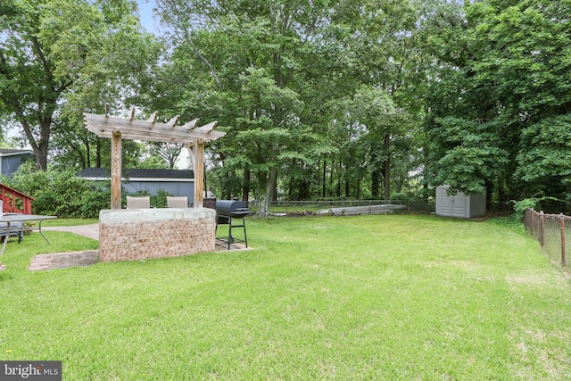 6937 Halleck St, District Heights, MD 20747 - fenced backyard featuring a storage shed and a pergola