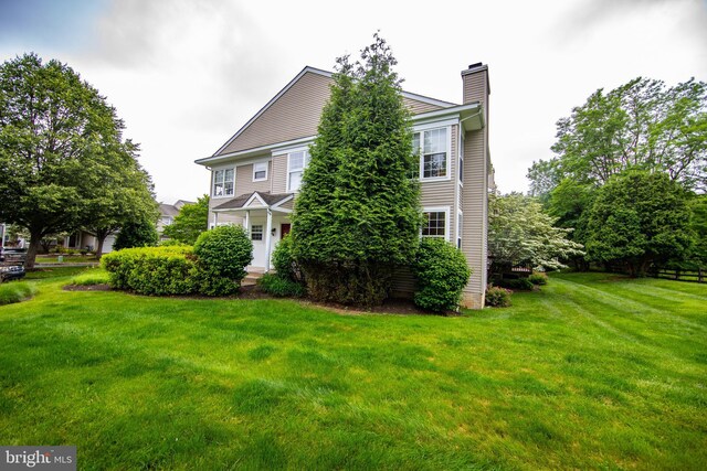 112 Jeffords Ct Unit 1601, Phoenixville, PA 19460 - view of front of property featuring a chimney and a front lawn