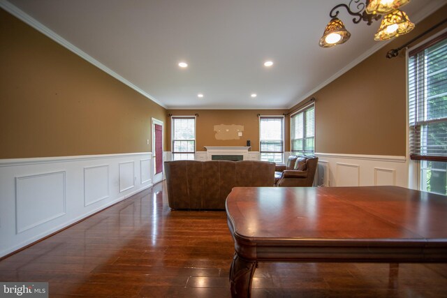 112 Jeffords Ct Unit 1601, Phoenixville, PA 19460 - dining space featuring crown molding, a decorative wall, a wainscoted wall, plenty of natural light, and a fireplace
