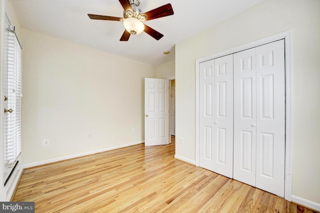 1030 Fairmont St NW Unit 204, Washington, DC 20001 - unfurnished bedroom featuring light wood-style flooring, a closet, baseboards, and a ceiling fan