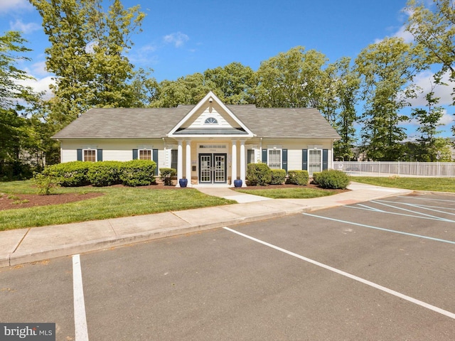 20005 Newry Dr Unit Y13, Rehoboth Beach, DE 19971 - view of front of house with uncovered parking and french doors
