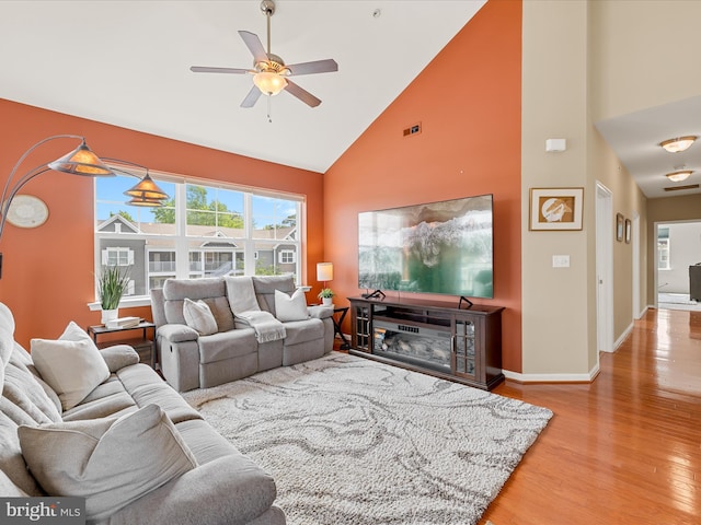 20005 Newry Dr Unit Y13, Rehoboth Beach, DE 19971 - living area with light wood-style flooring, high vaulted ceiling, and a ceiling fan