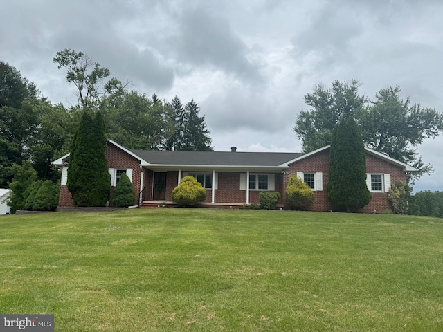 1404 Stockton Rd, Joppa, MD 21085 - ranch-style house featuring brick siding and a front yard