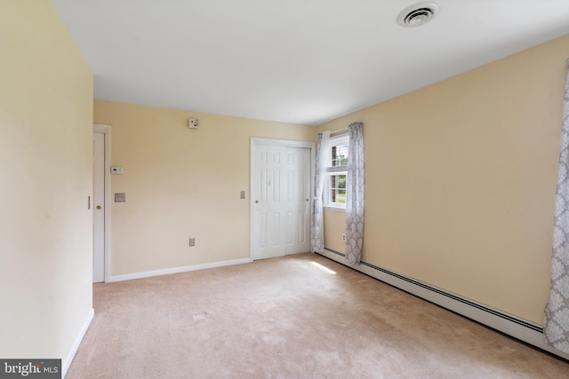 1404 Stockton Rd, Joppa, MD 21085 - unfurnished room with baseboard heating and carpet