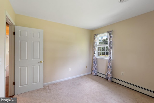 1404 Stockton Rd, Joppa, MD 21085 - unfurnished room featuring carpet flooring and a baseboard radiator
