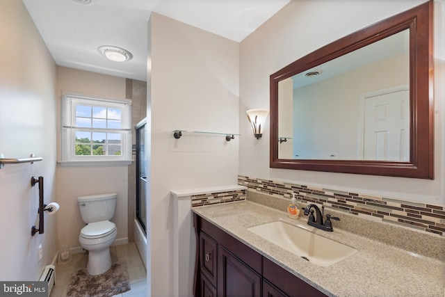 1404 Stockton Rd, Joppa, MD 21085 - full bath featuring baseboard heating, vanity, decorative backsplash, and shower / bath combination with glass door