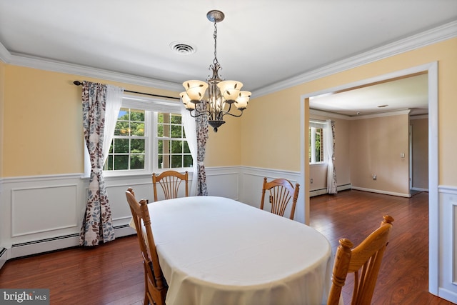 1404 Stockton Rd, Joppa, MD 21085 - dining space with a chandelier, plenty of natural light, wainscoting, wood finished floors, and crown molding