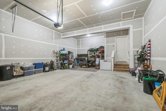 8604 Cedar Chase Dr, Clinton, MD 20735 - garage featuring a garage door opener