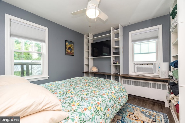 832 N Warren St, Pottstown, PA 19464 - bedroom with radiator heating unit, wood finished floors, and ceiling fan