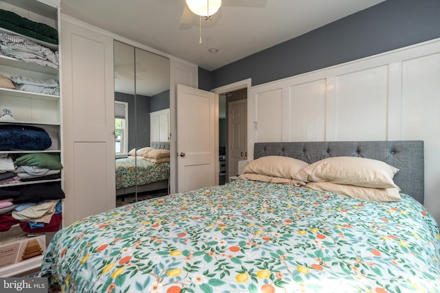 832 N Warren St, Pottstown, PA 19464 - bedroom featuring two closets, a decorative wall, and a ceiling fan