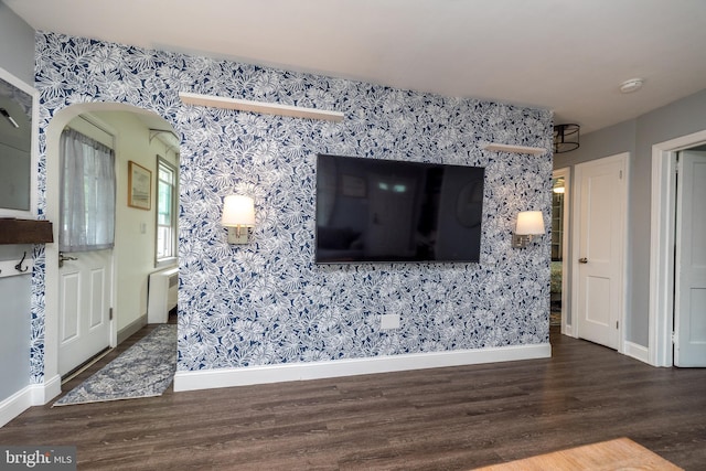 832 N Warren St, Pottstown, PA 19464 - living area with wood finished floors, baseboards, and wallpapered walls