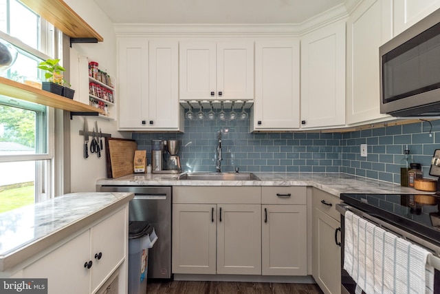 832 N Warren St, Pottstown, PA 19464 - kitchen featuring stainless steel appliances, a sink, decorative backsplash, and open shelves