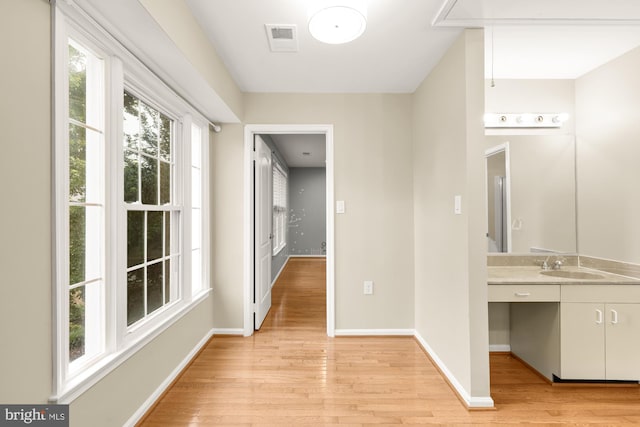 5501 Chestermill Ct, Fairfax, VA 22030 - corridor with light wood-style floors and attic access