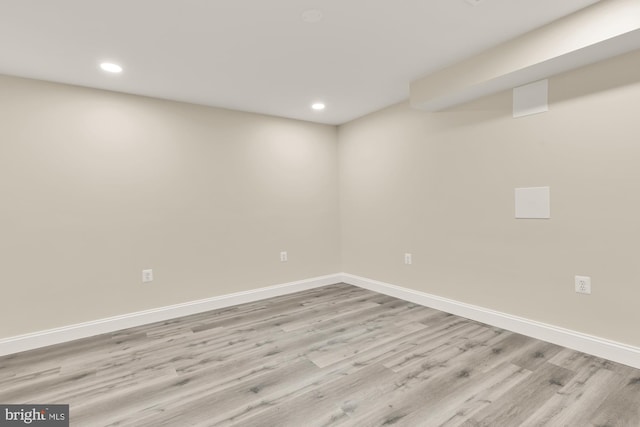 5501 Chestermill Ct, Fairfax, VA 22030 - below grade area with light wood-type flooring and recessed lighting