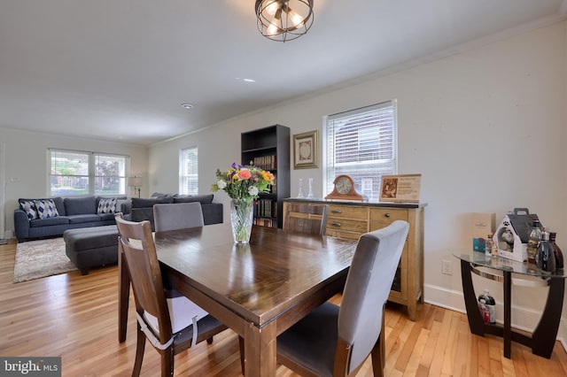 1304 Maple Ave, Lancaster, PA 17603 - dining room with ornamental molding, light wood-type flooring, and baseboards
