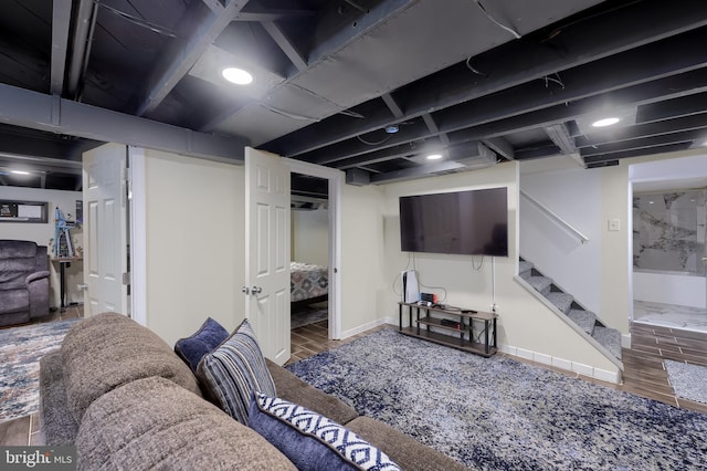 1304 Maple Ave, Lancaster, PA 17603 - living room with wood finished floors, stairway, and baseboards