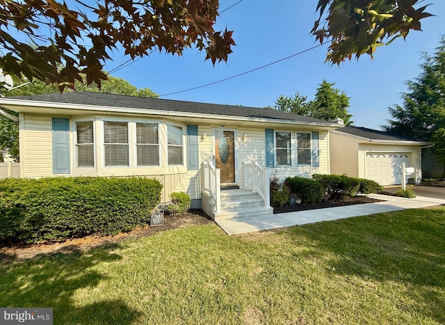 504 Redrow Ave, Swedesboro, NJ 08085 - single story home featuring a front lawn, an attached garage, driveway, and entry steps