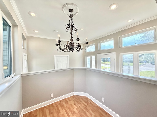 504 Redrow Ave, Swedesboro, NJ 08085 - unfurnished dining area featuring wood finished floors, recessed lighting, a chandelier, and crown molding