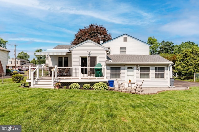 1227 Lynda Ln, Warminster, PA 18974 - back of property featuring a wooden deck and roof with shingles
