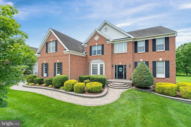 1427 Olmsted Dr, Bear, DE 19701 - view of front of property featuring brick siding, a front lawn, and a shingled roof