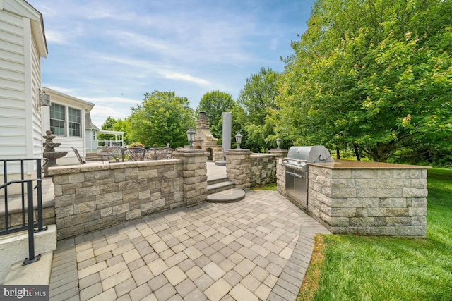 1427 Olmsted Dr, Bear, DE 19701 - view of patio / terrace featuring exterior kitchen