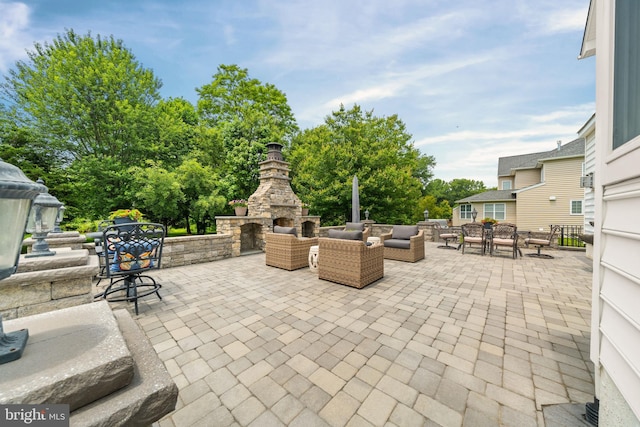1427 Olmsted Dr, Bear, DE 19701 - view of patio / terrace with outdoor dining area and an outdoor living space with a fireplace