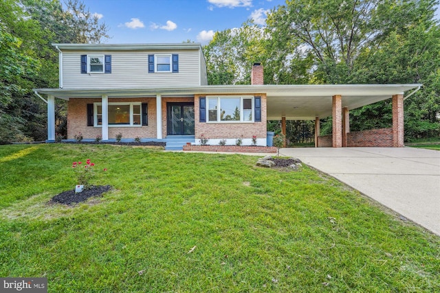 5202 Bayne Pl, Temple Hills, MD 20748 - traditional home featuring driveway, a chimney, brick siding, a front yard, and covered porch