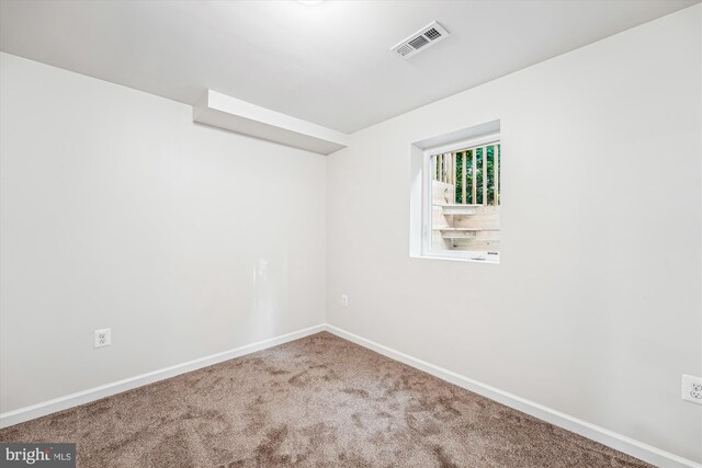 5202 Bayne Pl, Temple Hills, MD 20748 - carpeted spare room featuring baseboards