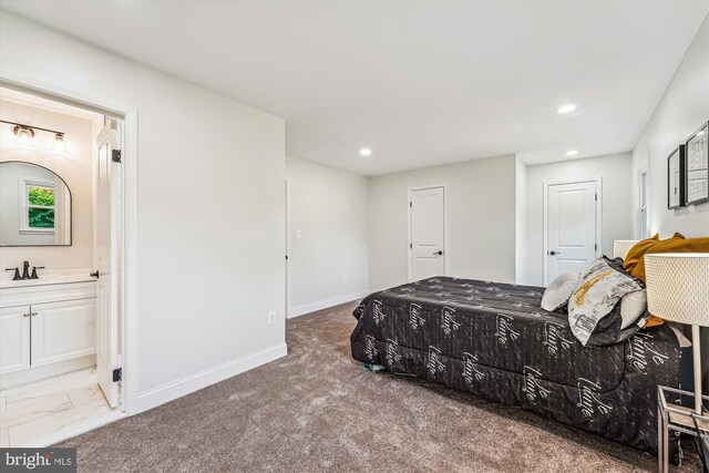 5202 Bayne Pl, Temple Hills, MD 20748 - bedroom with recessed lighting, baseboards, ensuite bathroom, and a sink