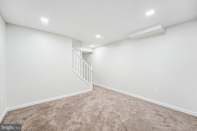 5202 Bayne Pl, Temple Hills, MD 20748 - finished below grade area with carpet, recessed lighting, baseboards, and stairs