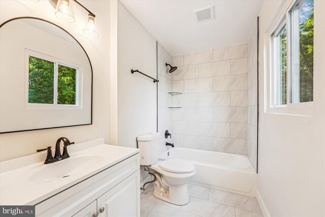 5202 Bayne Pl, Temple Hills, MD 20748 - bathroom featuring vanity, toilet, and shower / bath combination