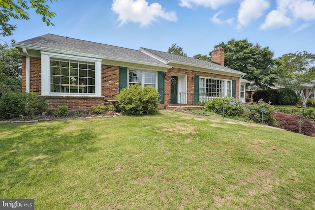 6622 Skyline Ct, Alexandria, VA 22307 - ranch-style home featuring brick siding, a chimney, and a front lawn