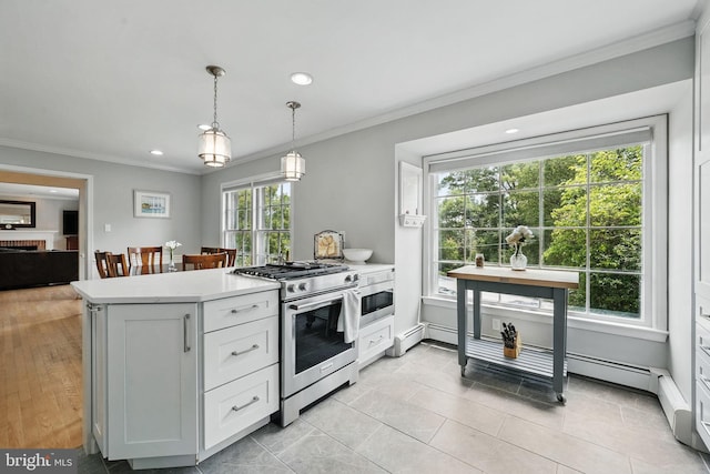 6622 Skyline Ct, Alexandria, VA 22307 - kitchen with stainless steel range with gas cooktop, light countertops, recessed lighting, ornamental molding, and pendant lighting