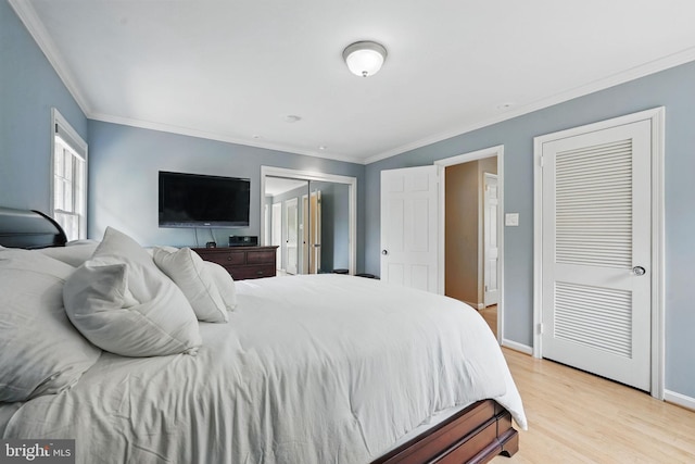 6622 Skyline Ct, Alexandria, VA 22307 - bedroom featuring crown molding, light wood-style floors, and baseboards