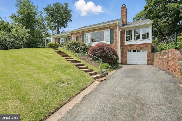 6622 Skyline Ct, Alexandria, VA 22307 - ranch-style home featuring asphalt driveway, brick siding, a chimney, a front lawn, and an attached garage