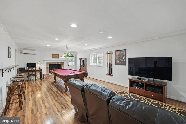 6622 Skyline Ct, Alexandria, VA 22307 - playroom featuring billiards, wood finished floors, a fireplace, recessed lighting, and a wall mounted air conditioner