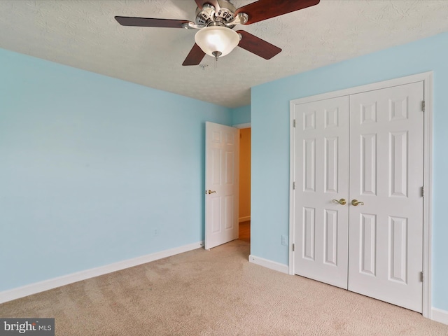 6344 Springwater Ter Unit 1141, Frederick, MD 21701 - unfurnished bedroom featuring carpet flooring, a closet, a textured ceiling, and a ceiling fan
