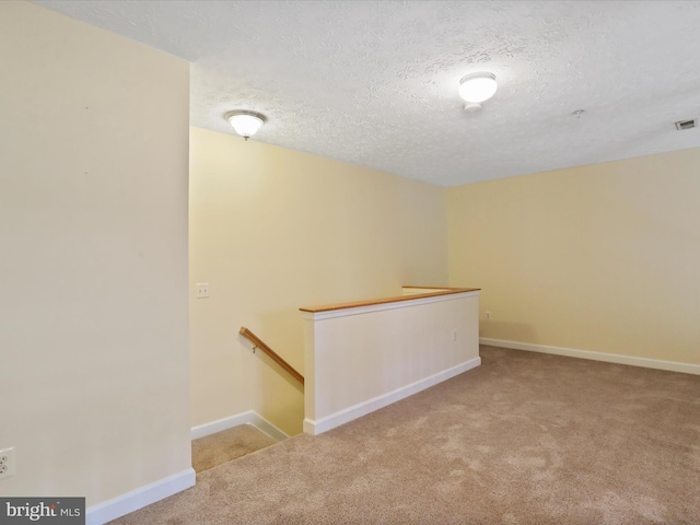 6344 Springwater Ter Unit 1141, Frederick, MD 21701 - carpeted spare room featuring a textured ceiling