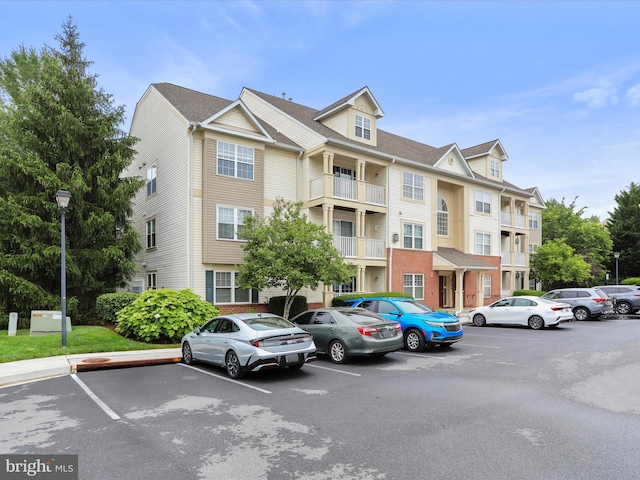 6344 Springwater Ter Unit 1141, Frederick, MD 21701 - view of property featuring uncovered parking