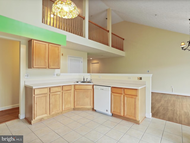 6344 Springwater Ter Unit 1141, Frederick, MD 21701 - kitchen featuring dishwasher, a chandelier, high vaulted ceiling, a peninsula, and light tile patterned floors