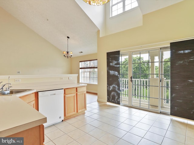 6344 Springwater Ter Unit 1141, Frederick, MD 21701 - kitchen with dishwasher, a chandelier, high vaulted ceiling, light tile patterned flooring, and light countertops