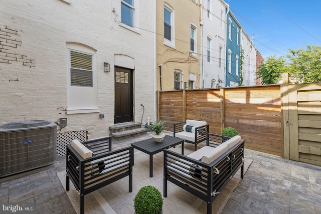 344 Elm St NW, Washington, DC 20001 - fenced backyard with central AC unit, entry steps, an outdoor living space, and a patio