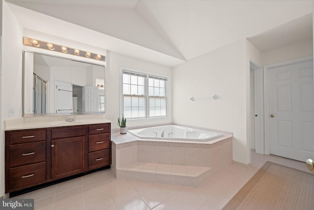 915 Mather Dr, Bear, DE 19701 - full bathroom with vanity, a bath, tile patterned floors, and vaulted ceiling