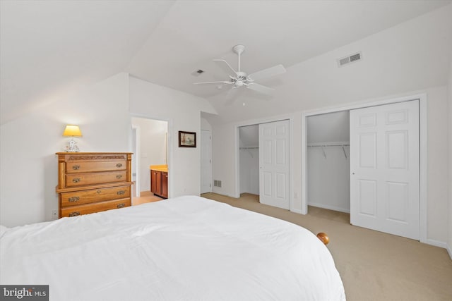 915 Mather Dr, Bear, DE 19701 - bedroom with multiple closets, lofted ceiling, light carpet, and ceiling fan
