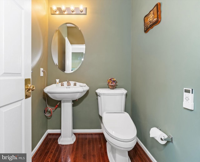 915 Mather Dr, Bear, DE 19701 - half bathroom with wood finished floors and toilet