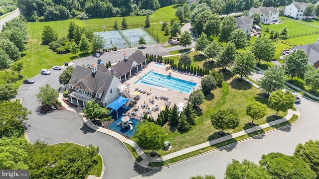 915 Mather Dr, Bear, DE 19701 - aerial view of a pool area and a tree filled landscape