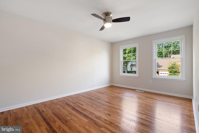 6015 Forest Run Dr, Clifton, VA 20124 - empty room featuring baseboards, a ceiling fan, and wood finished floors