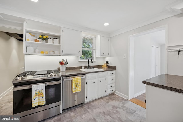 2120 Grand Ave, Morton, PA 19070 - kitchen with stainless steel appliances, a sink, dark countertops, white cabinetry, and recessed lighting