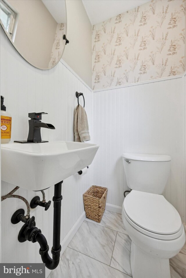 2120 Grand Ave, Morton, PA 19070 - half bathroom with a wainscoted wall, toilet, marble finish flooring, and wallpapered walls